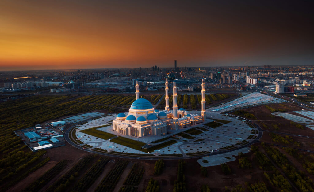 Aerial view of The Grand Mosque of Astana in Kazakhstan during beautiful sunset. It is the largest mosque in Central Asia and one of the largest in the world
